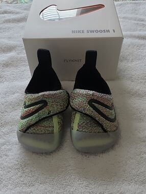 Nike Kids Flyknit Slip-On Sneakers in Black and Multicolor